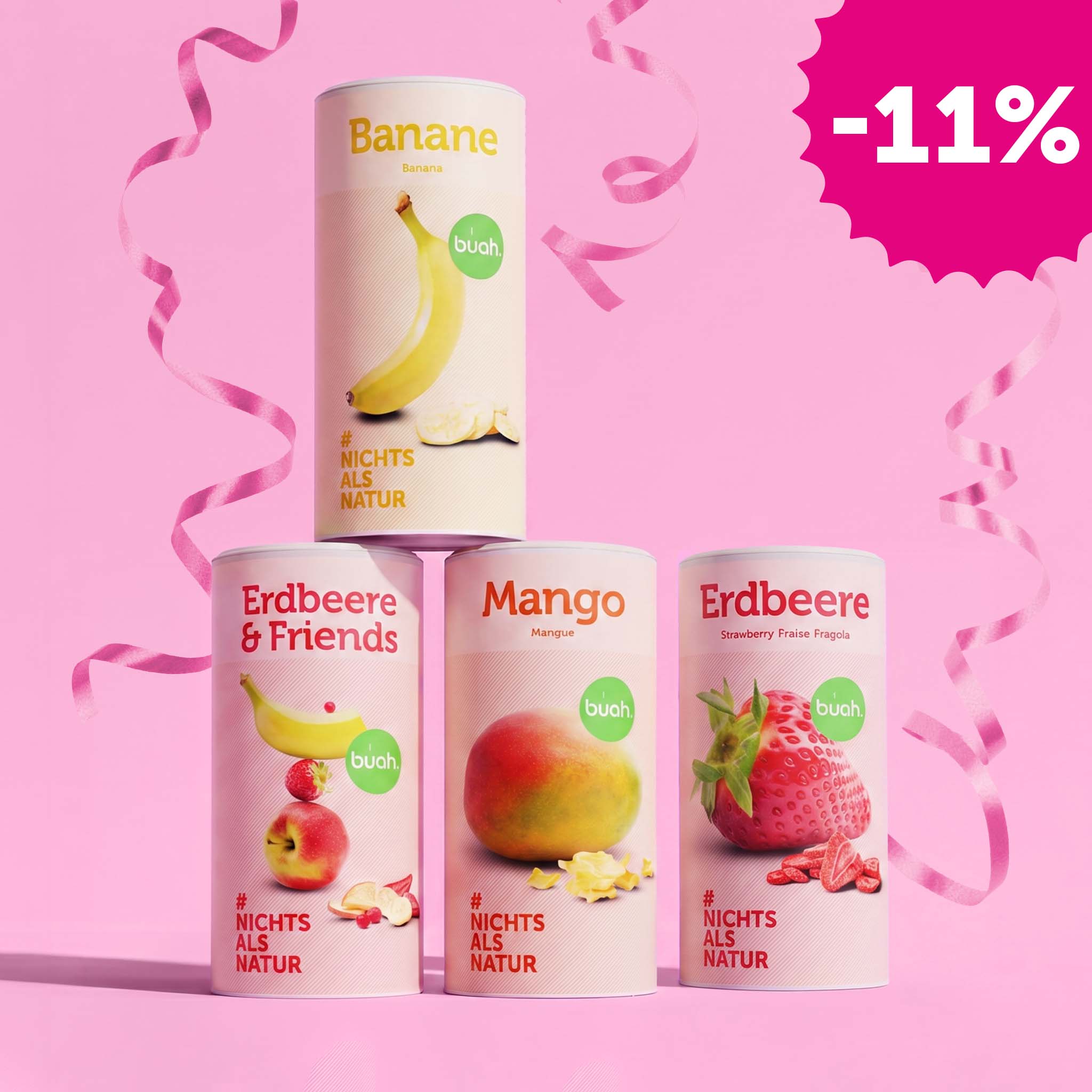 Vier große Dosen buah gefriergetrocknete Früchte bilden eine Pyramide vor einem pinken Hintergrund mit herabfallenden rosa Luftschlangen. Oben steht Banane, darunter Erdbeere & Friends, Mango und Erdbeere. Oben rechts ist ein gezackter Badge mit „-11%“.